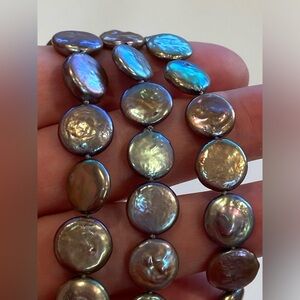 Freshwater coin pearls, purple iridescent, about 1/2” diameter each, silk, 60”